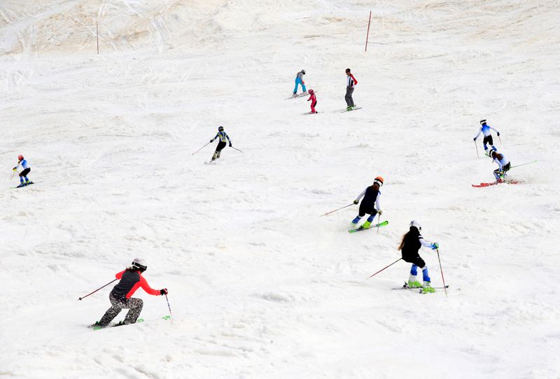 People ski on the slopes of Kanin after the Slovenian government called an official end to the country's coronavirus disease (COVID-19) outbreak, in Kanin