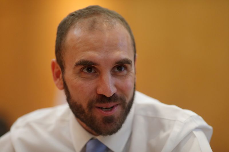 Argentine Economy Minister Martin Guzman reacts during an interview with Reuters, in Buenos Aires