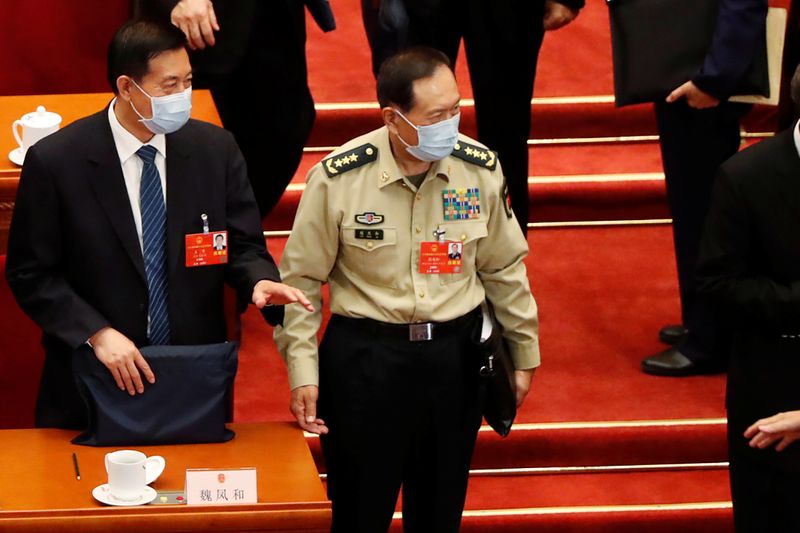 Chinese Defense Minister Wei Fenghe attends the opening session of NPC in Beijing