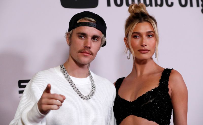 FILE PHOTO: Singer Bieber and his wife Hailey Baldwin pose at the premiere for the documentary television series
