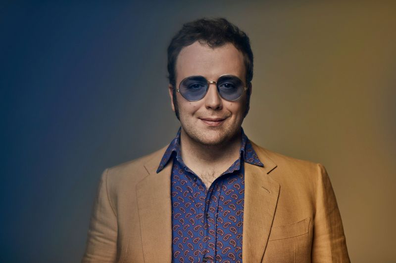 Italian pop-jazz artist, Raphael Gualazzi poses
