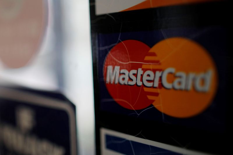 A sticker shows that a store accepts MasterCard in Harvard Square in Cambridge