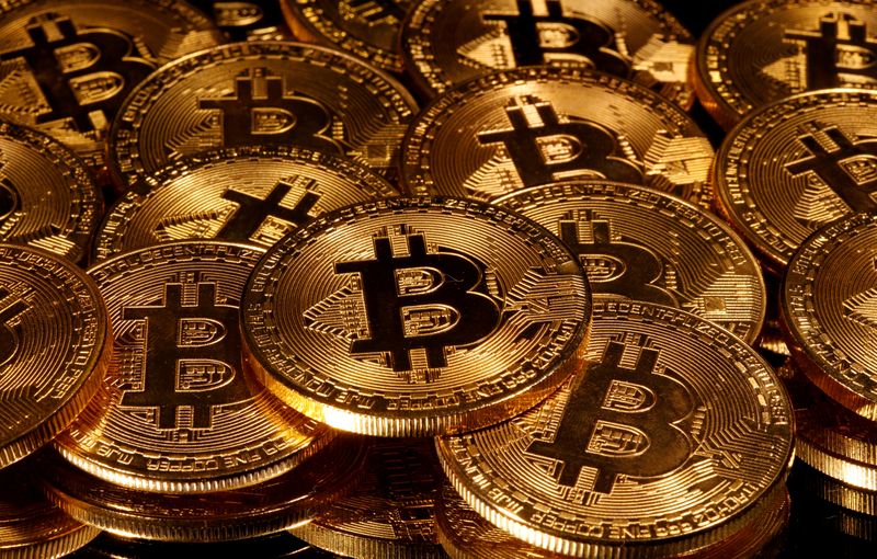 FILE PHOTO: Representations of virtual currency Bitcoin are seen in this picture illustration taken