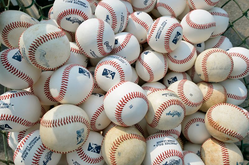 Basket of baseballs are seen during practice at a minor league baseball game in Maryland