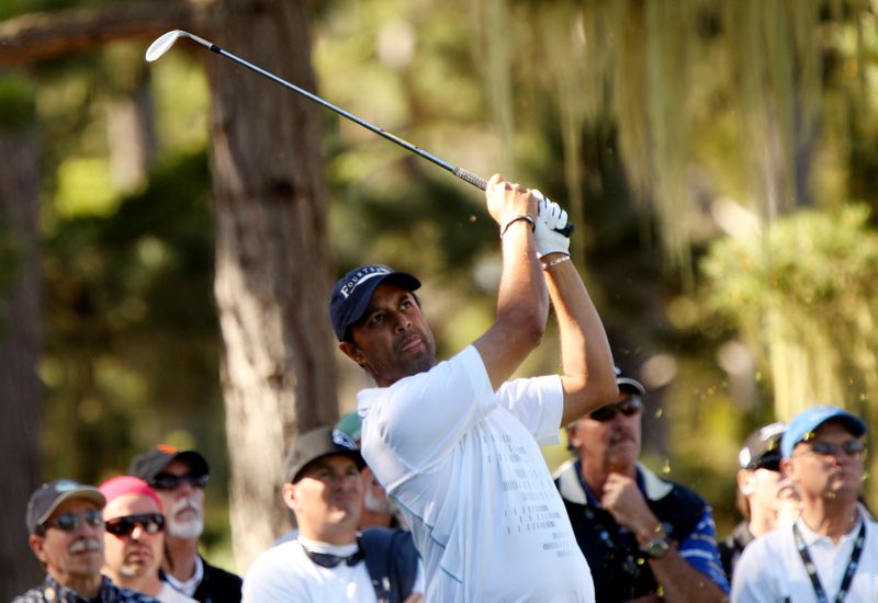 FILE PHOTO: Atwal tees off on the 15th hole at Spyglass Hill golf course during the first round of the Pebble Beach National Pro-Am