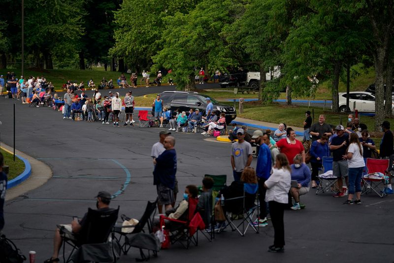 People wait outside Kentucky Career Center in Frankfort
