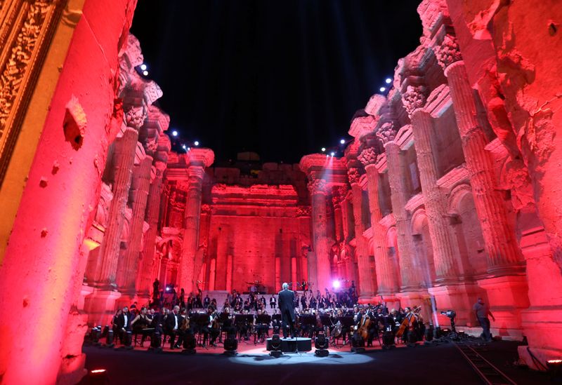 Musicians from Lebanon's philharmonic orchestra are seen on stage before the start of