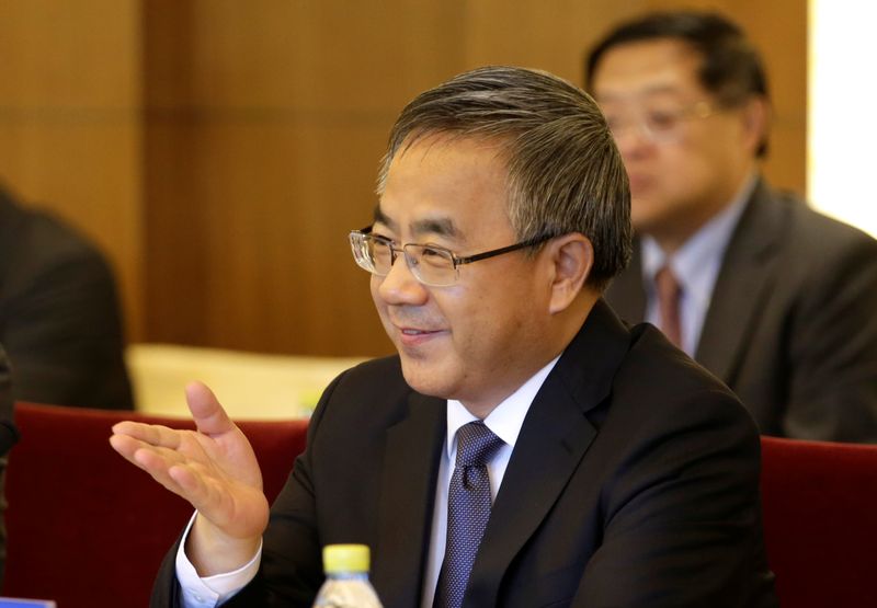 Chinese Vice Premier Hu Chunhua attends a meeting with Britain's Chancellor of the Exchequer Philip Hammond in Beijing