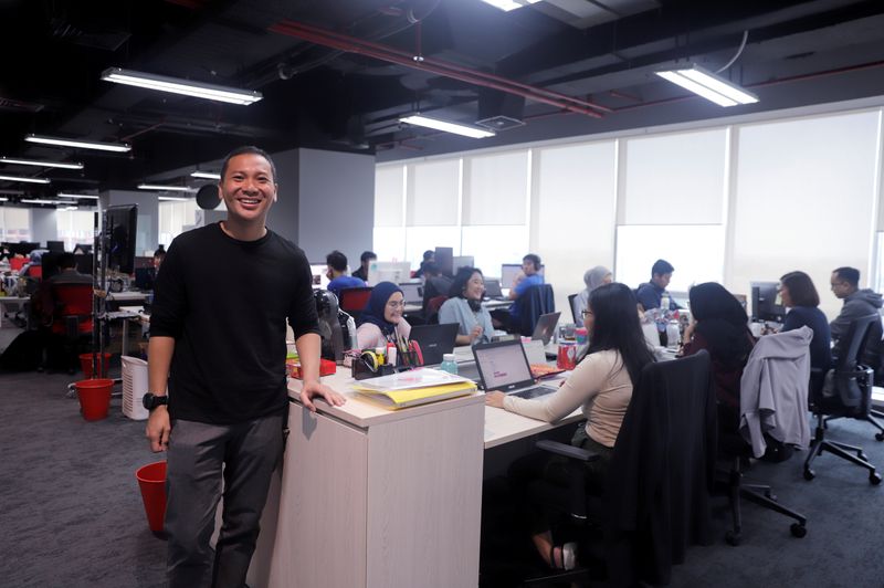 CEO of Indonesian e-commerce startup Bukalapak, Rachmat Kaimuddin, poses for a photo at their headquarters in Jakarta