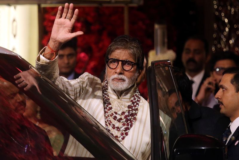 Bollywood actor Amitabh Bachchan leaves after attending the wedding ceremony of Isha Ambani in Mumbai
