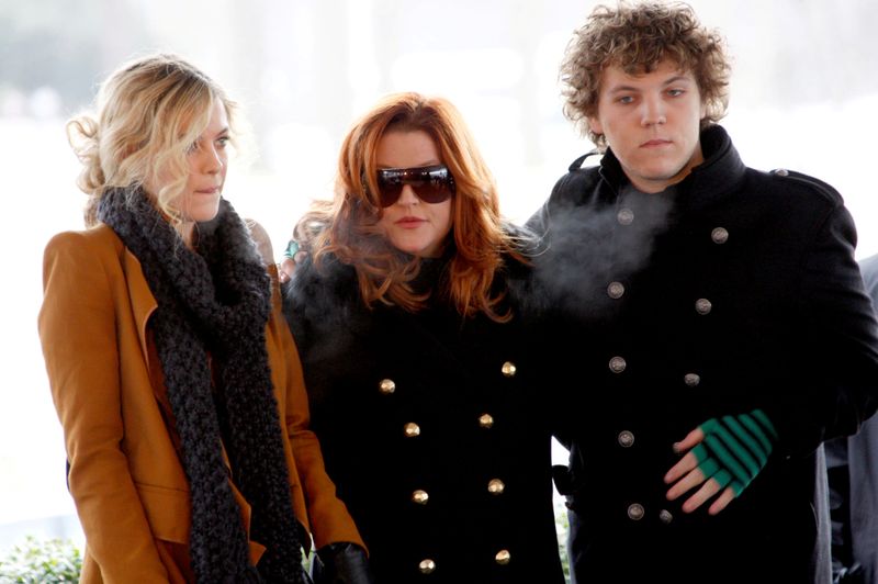 FILE PHOTO: Lisa Marie Presley, with her children Riley and Benjamin Keough, attend the 75th birthday celebration for Elvis Presley in Memphis