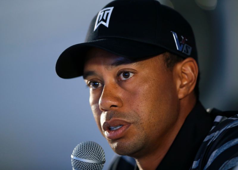 U.S. golfer Woods speaks during a news conference at the Farmers Insurance Open in San Diego