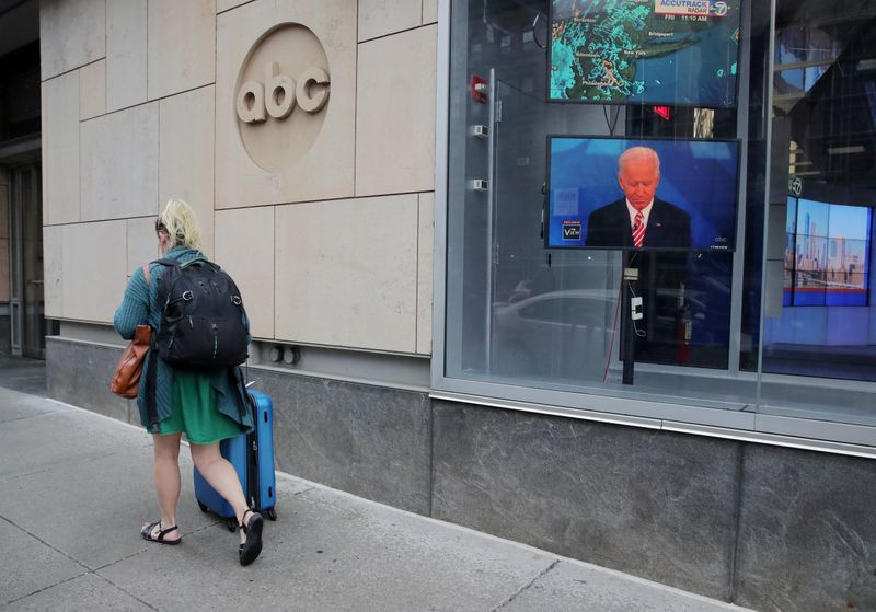 FILE PHOTO: A screen outside ABC's studios shows Democratic presidential candidate Joe Biden ABC's 'The View' in New York