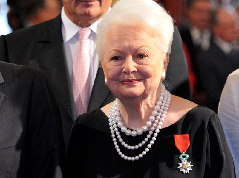 FILE PHOTO: Actress Olivia de Havilland looks on after she was awarded with the Legion d'honneur at the Elysee Palace, France