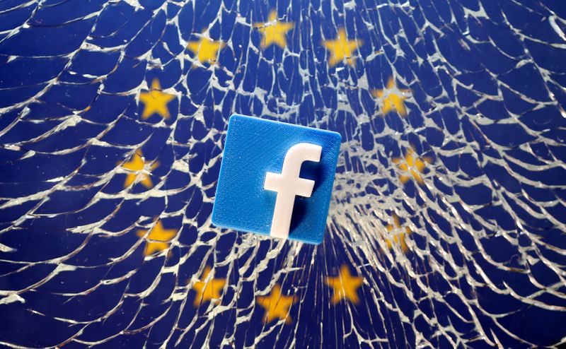 A 3D printed Facebook logo is placed on broken glass above a printed EU flag in this illustration