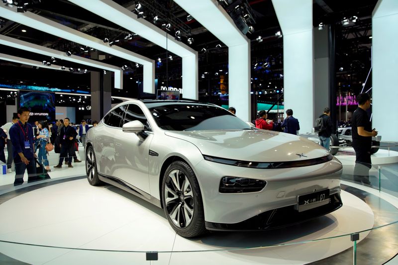 FILE PHOTO: XPeng's electric vehicle (EV) P7 is unveiled during the media day for the Shanghai auto show