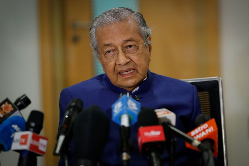 Malaysia's former Prime Minister Mahathir Mohamad speaks during a news conference in Kuala Lumpur