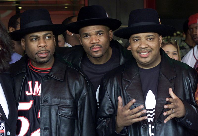 FILE PHOTO: MEMBERS OF THE MUSICAL GROUP RUN-DMC POSE AT HOLLYWOOD'S ROCKWALK.