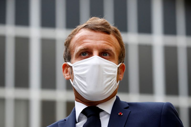 French President Emmanuel Macron visits a site of pharmaceutical group Seqens
