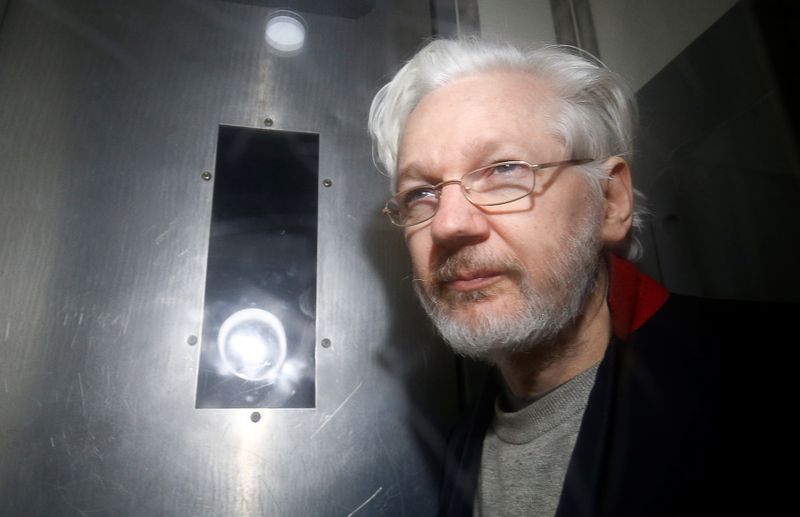United Kingdom extradition hearing for WikiLeaks' Julian Assange postponed over COVID-19 concerns