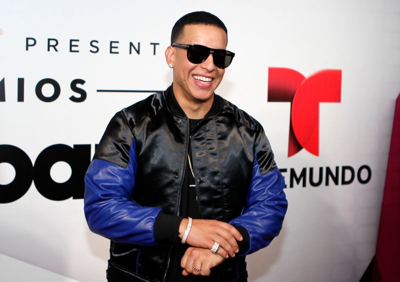 FILE PHOTO: Daddy Yankee poses backstage at the 2015 Latin Billboard Awards in Coral Gables