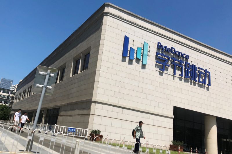 People walk past the Bytedance headquarters building in Beijing