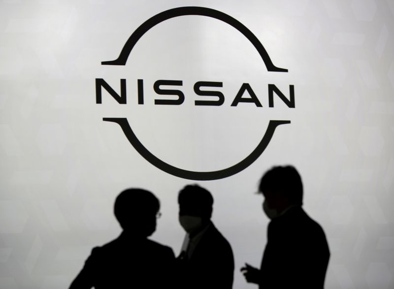 FILE PHOTO: The brand logo of Nissan Motor Corp. is displayed during a press preview of the company's new Ariya all-battery SUV in Yokohama
