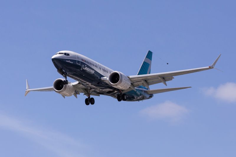 FILE PHOTO: A Boeing 737 MAX airplane lands after a test flight at Boeing Field in Seattle