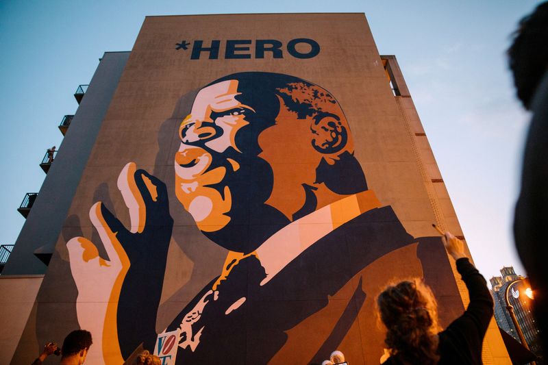 Mourners of the late Rep. John Lewis hold a vigil in his memory in Atlanta