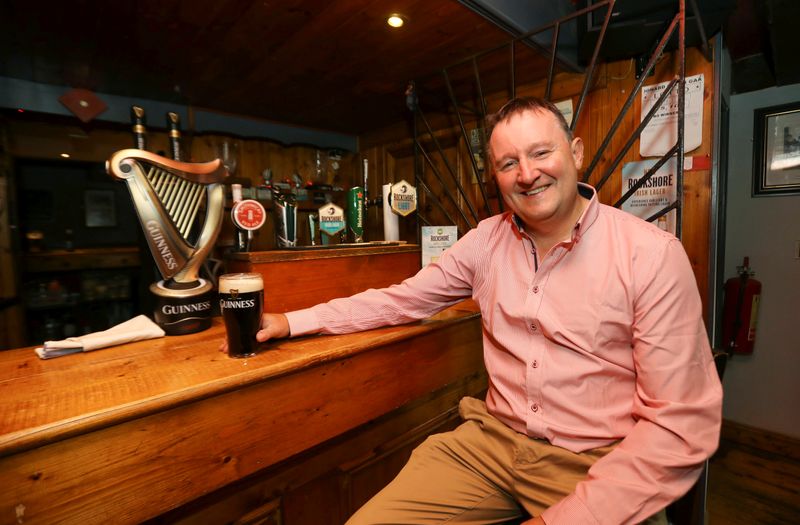 Publican Paul Moynihan prepares for reopening his pub in Donard, County Wicklow, Ireland