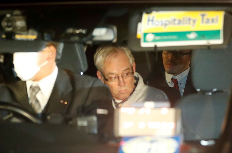 FILE PHOTO - Greg Kelly, the former deputy of ousted Nissan chairman Carlos Ghosn, is seen in the car, as he leaves after being released from a detention centre in Tokyo