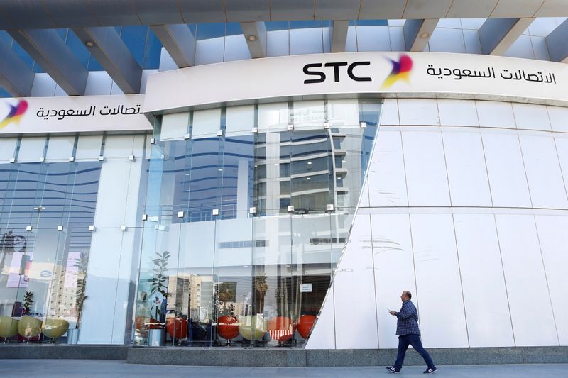 A man passes the Saudi Telecom STC office in Riyadh