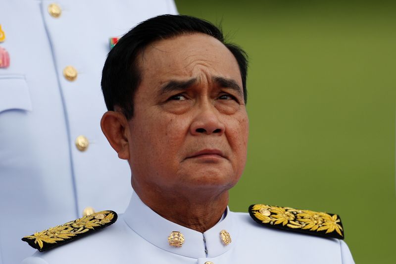 Thailand's Prime Minister Prayuth Chan-ocha attends a family photo session with new cabinet ministers at the Government House in Bangkok
