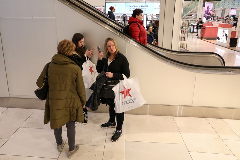 People shop at Macy's Department store in New York