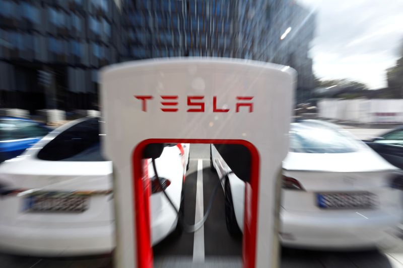 FILE PHOTO: Tesla managers demonstrate V3 superchargers on German research campus in Berlin