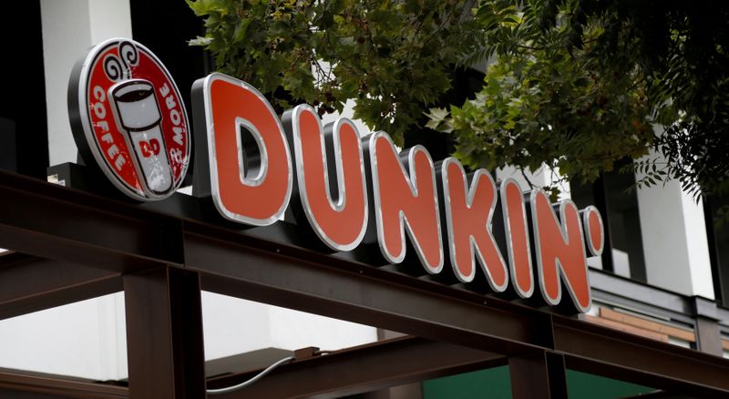 FILE PHOTO: The sign of a Dunkin' store, the first since a rebranding by the Dunkin' Donuts chain, is pictured ahead of its opening in Pasadena
