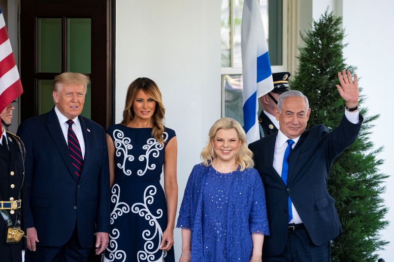 U.S. President Donald Trump welcomes Israeli Prime Minister Benjamin Netanyahu and his wife Sara