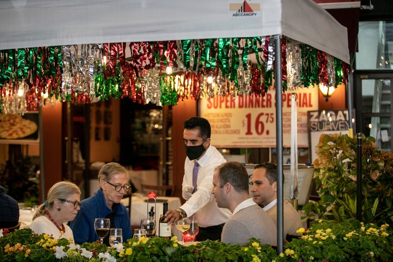 FILE PHOTO: People enjoy outdoor dining amid the coronavirus disease (COVID-19) outbreak in Manhattan