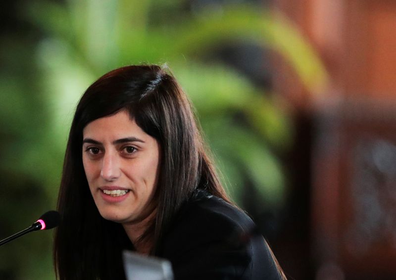 Peru's Finance Minister Maria Antonieta Alva talks to the media during a news conference at the Government Palace in Lima