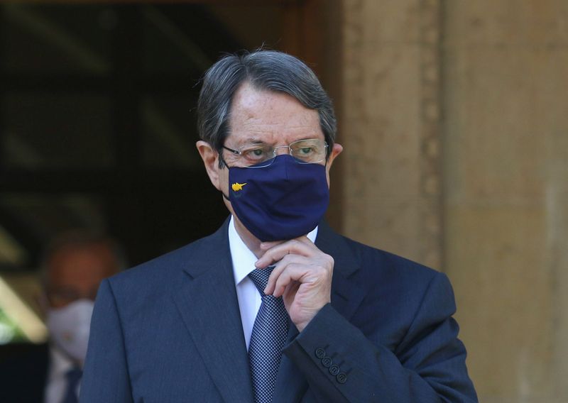 Cypriot President Nicos Anastasiades waits to welcome European Council President Charles Michel at the Presidential Palace in Nicosia