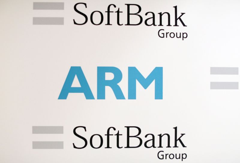 FILE PHOTO: An ARM and SoftBank Group branded board is displayed at a news conference in London