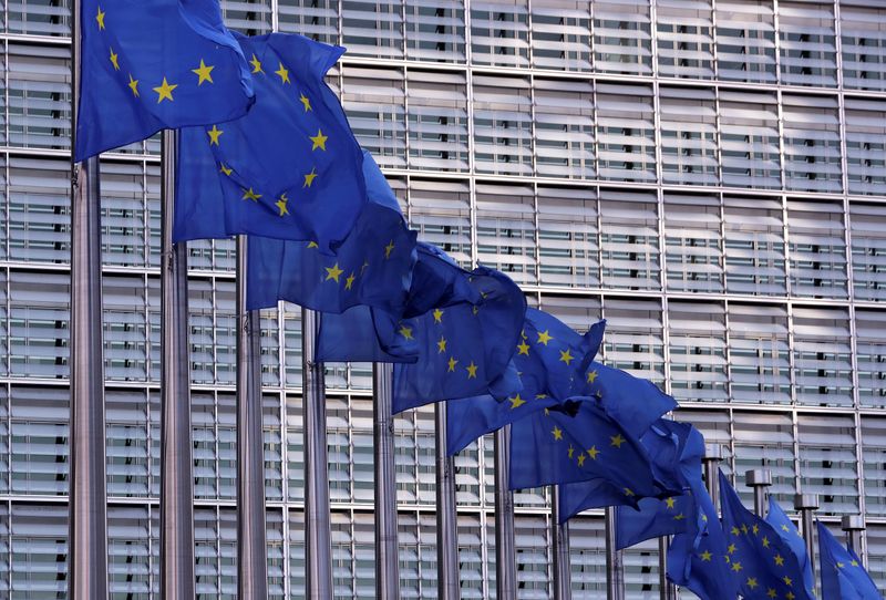 European Union flags fly outside the European Commission headquarters in Brussels