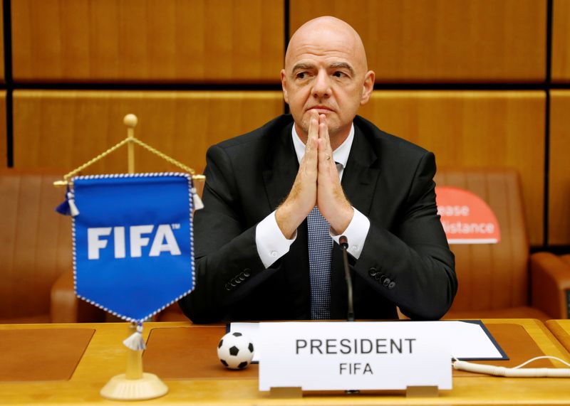 FILE PHOTO: FIFA President Infantino waits for a signing ceremony in Vienna