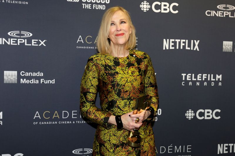 FILE PHOTO: Catherine O'Hara poses backstage with the award for best actress in a comedy at the 7th annual Canadian Screen Awards in Toronto, Canada