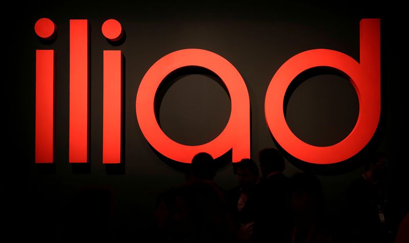 FILE PHOTO: Guests waits before French telecoms operator Iliad the media conference in Milan