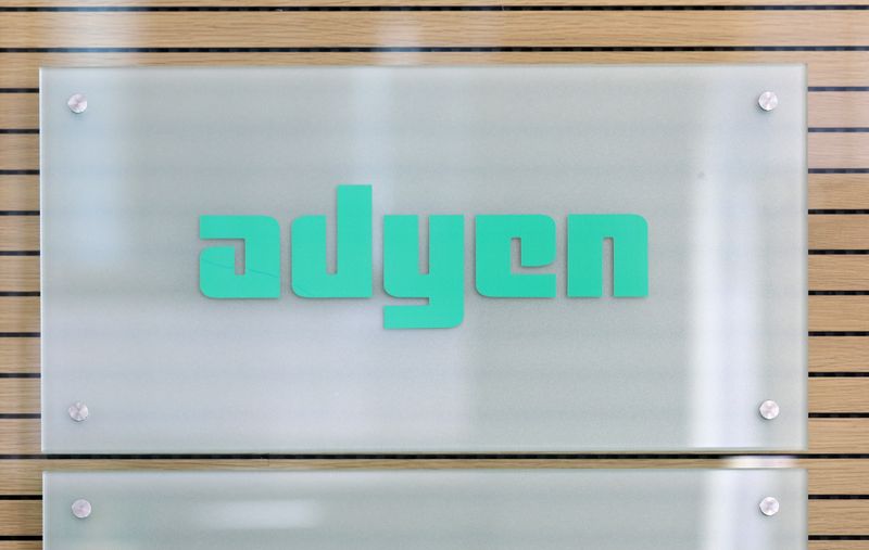 The Adyen logo is seen at the reception desk of the company's headquarters in Amsterdam
