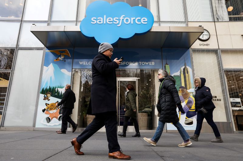 People pass by the Salesforce Tower and Salesforce.com offices in New York
