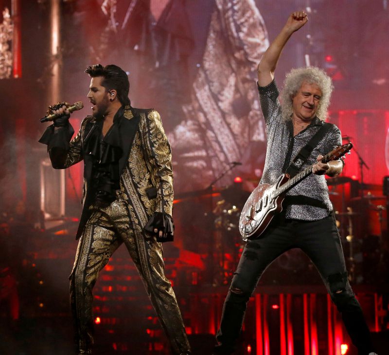 FILE PHOTO: Guitarist May of band Queen and singer Lambert perform during The Rhapsody Tour at The Forum in Inglewood