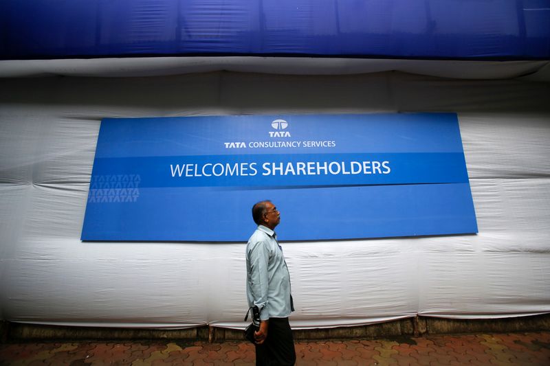 A shareholder arrives for the TCS annual general meeting in Mumbai