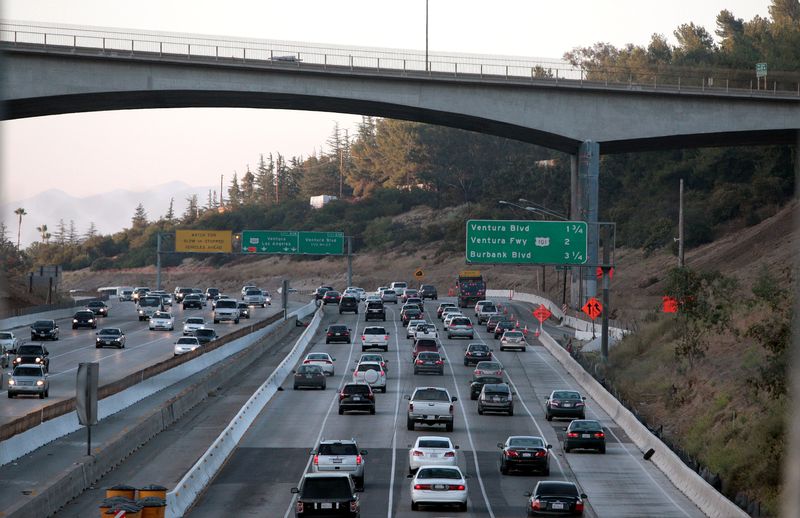 FILE PHOTO: Cars drive underneath the Mulholland Bridge on the 405 freeway in Los Angeles, California
